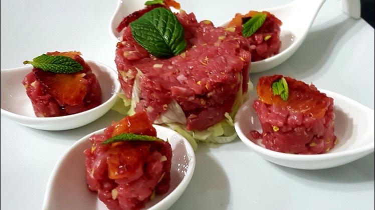Tartara di carne ai sapori siculi con arancia e menta
